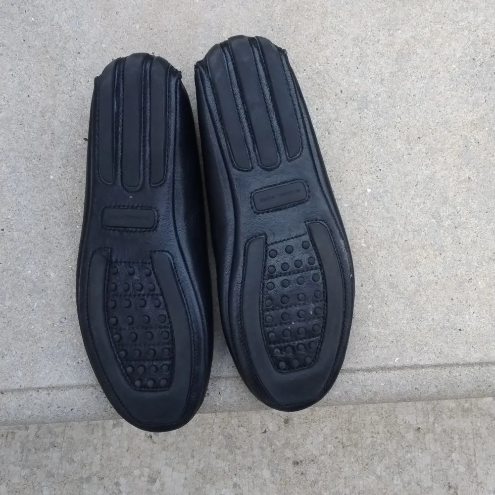 Michael Kors black leather flats with MK logo. Size 7.5
